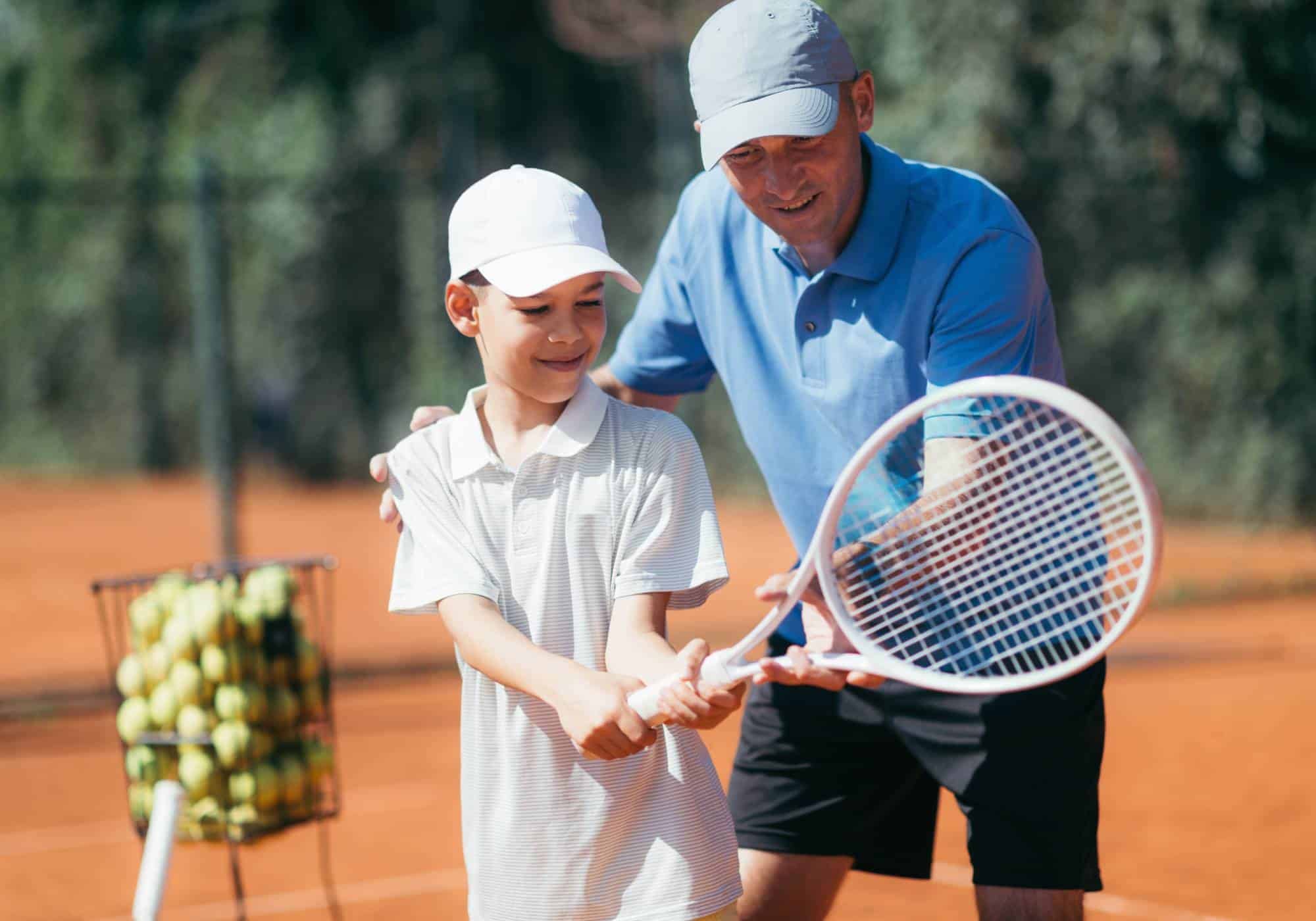 Tennis coach developing talent performance training