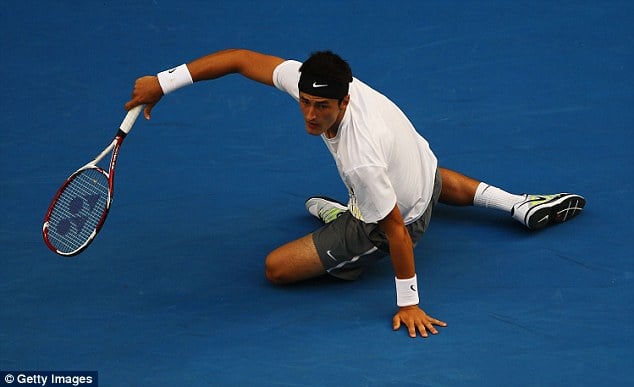 Bernard Tomic reverse racket against Fognini Madrid 2016